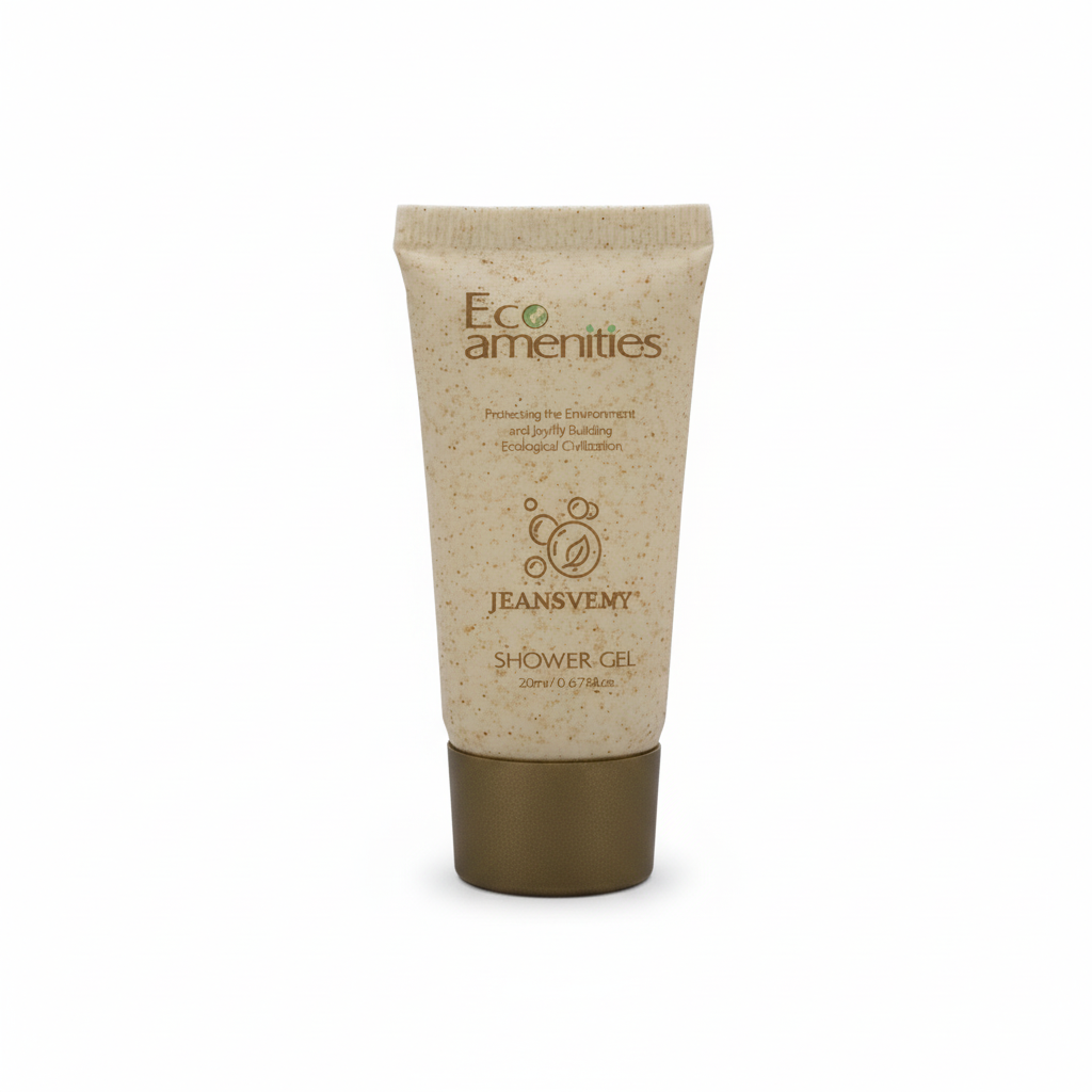 Tube of Eco Amenities shower gel on a stone surface with natural elements in the background