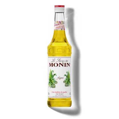 Bottle of Monin agave syrup on a white background