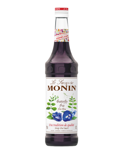 Monin butterfly pea syrup bottle on a white background