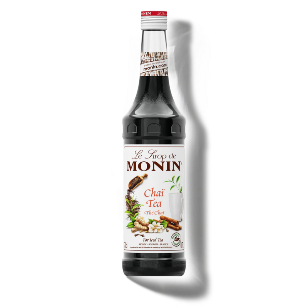 Monin Chai Tea syrup bottle on a white background