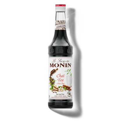 Monin Chai Tea syrup bottle on a white background
