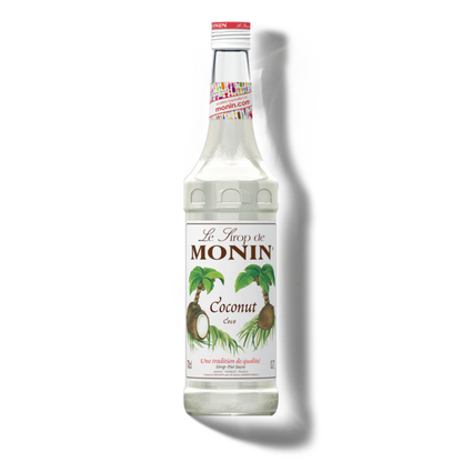 Monin coconut syrup bottle on a white background