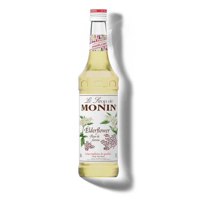Monin Elderflower syrup bottle on a white background