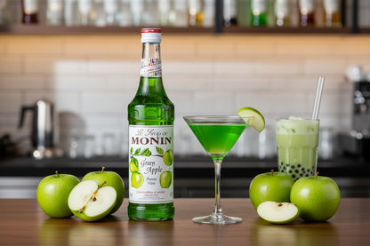 Monin Green Apple Syrup 700ml - Premium French green apple flavoring syrup with authentic crisp tart Granny Smith apple flavor for Appletini cocktails, bubble tea, mocktails, and refreshing beverages. Professional quality for bars, bubble tea shops, cafes, and restaurants in Nepal. Delivery across Nepal.