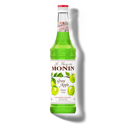 Green bottle of Monin Green Apple syrup on a white background