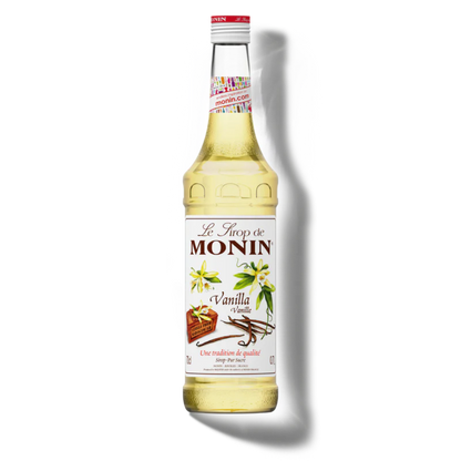 Monin vanilla syrup bottle on a white background